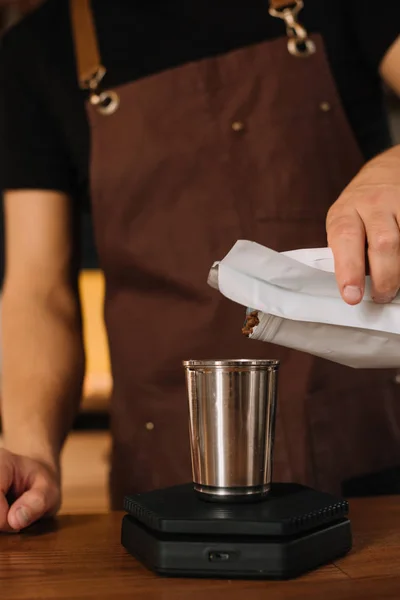 Partial view of barista preparing coffee — Stock Photo