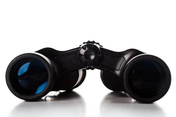 Binoculares negros con lente en blanco - foto de stock