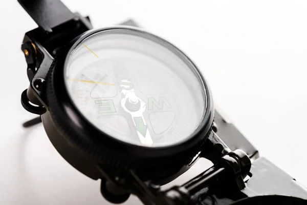 Close up of black vintage compass on white — Stock Photo