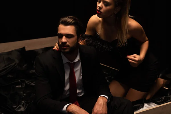 Beautiful elegant sexy couple in dark room — Stock Photo