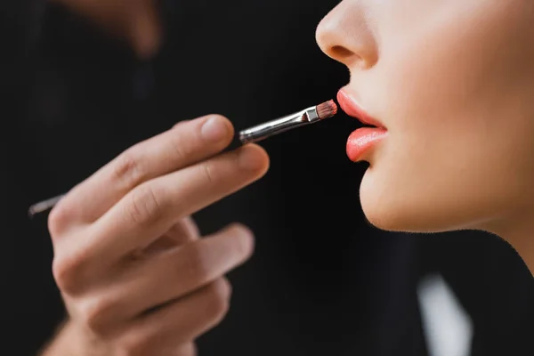 Cropped view of Makeup Artist doing makeup to model on backstage — Stock Photo