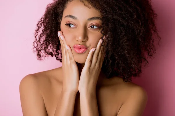 Portrait of cheerful beautiful naked african american girl on pink — Stock Photo