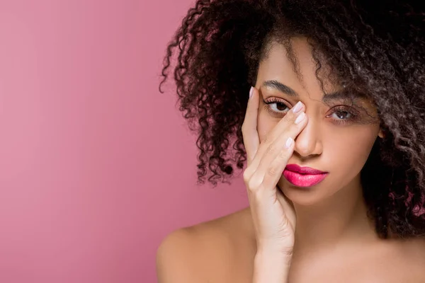 Portrait of beautiful tired african american girl, isolated on pink — Stock Photo