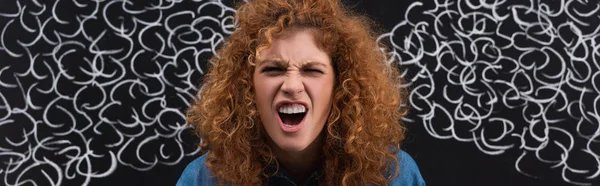 Panoramic shot of angry redhead woman shouting with steam drawing on chalkboard — Stock Photo