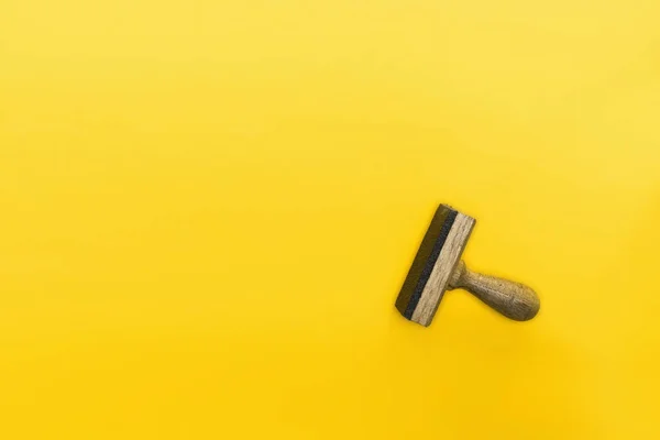 Top view of stamp isolated on yellow, quality concept — Stock Photo