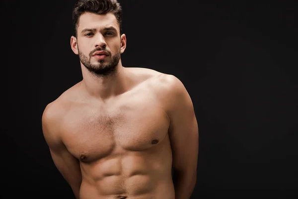 М'язистий сексуальний голий чоловік ізольований на чорному — стокове фото