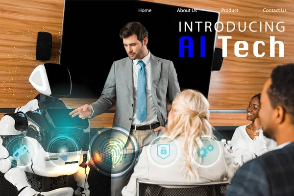 Handsome businessman pointing with hand at robot near multicultural colleagues, ai tech illustration — Stock Photo
