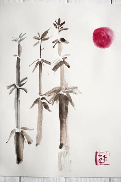 Papieroberseite mit japanischer Malerei mit Bambus, rosa Sonne und Siegel auf Holzgrund — Stockfoto