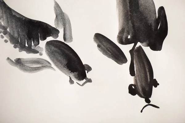 Японская картина с окрашенными рыбами на белом — стоковое фото