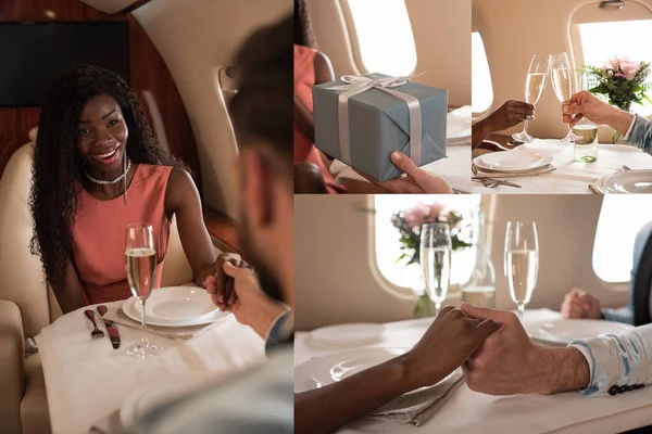 Colagem de feliz casal interracial de mãos dadas, taças de champanhe clinking, e presente de presente homem para mulher afro-americana no avião — Fotografia de Stock