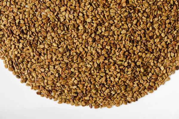 Close up view of natural fenugreek on white background — Stock Photo