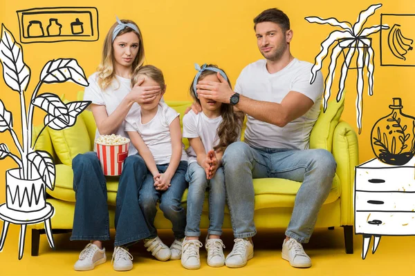 Skeptical parents closing eyes to kids while watching movie on sofa with popcorn bucket on yellow, interior illustration — Stock Photo