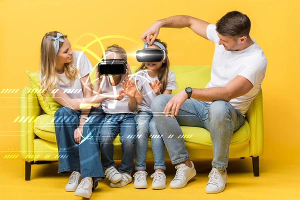 Happy parents with daughter and son in virtual reality headsets sitting on sofa on yellow, digital illustration — Stock Photo