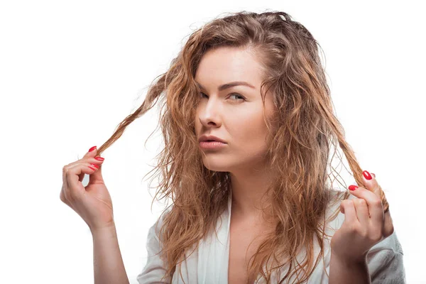 Skeptische blonde Frau — Stockfoto