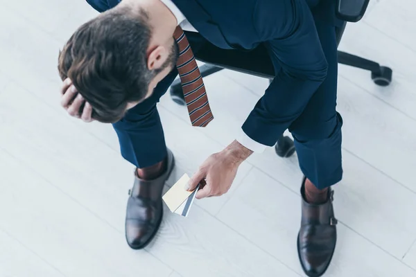 Overhead View Upset Businessman Sitting Office Chair Bowed Head Holding — Stock Photo, Image