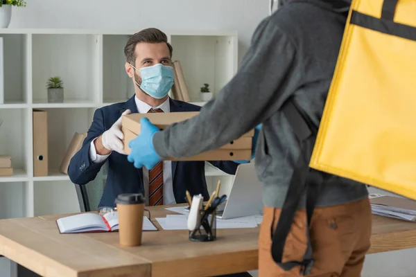 Partial View Food Delivery Man Giving Pizza Boxes Businessman Medical — Stock Photo, Image