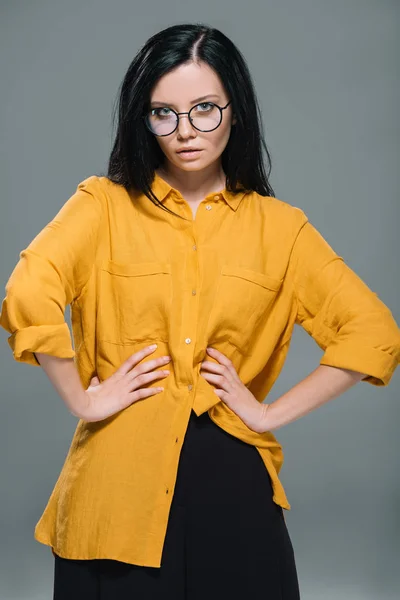 Brunette woman in yellow blouse — Stock Photo