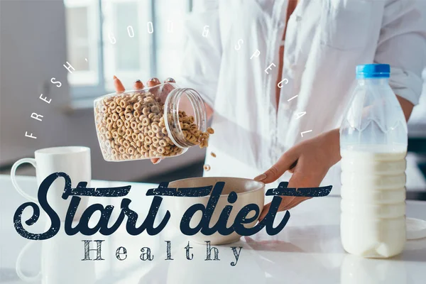 Cropped view of girl having cornflakes with milk for breakfast on quarantine with start diet healthy lettering — Stock Photo