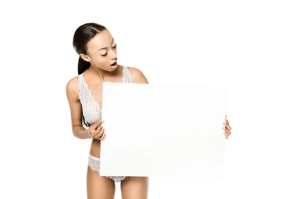 Shocked african american woman with banner — Stock Photo, Image