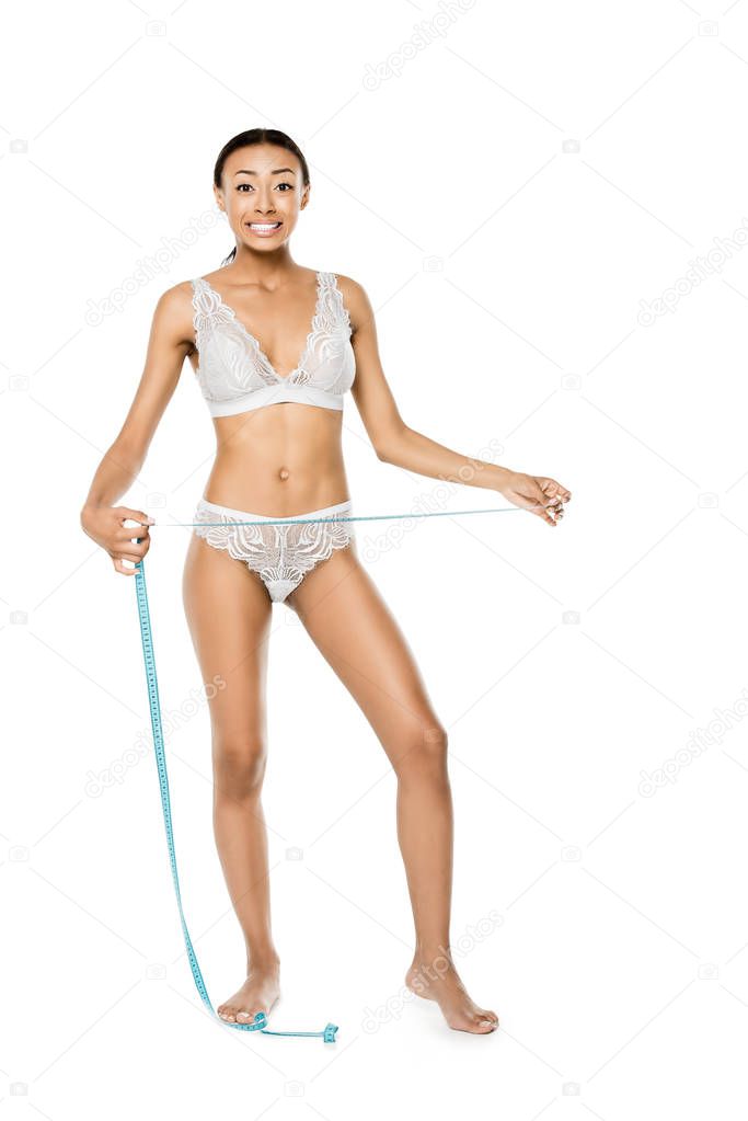 african american woman with measuring tape