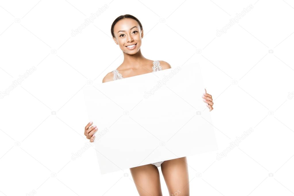 smiling african american woman with banner