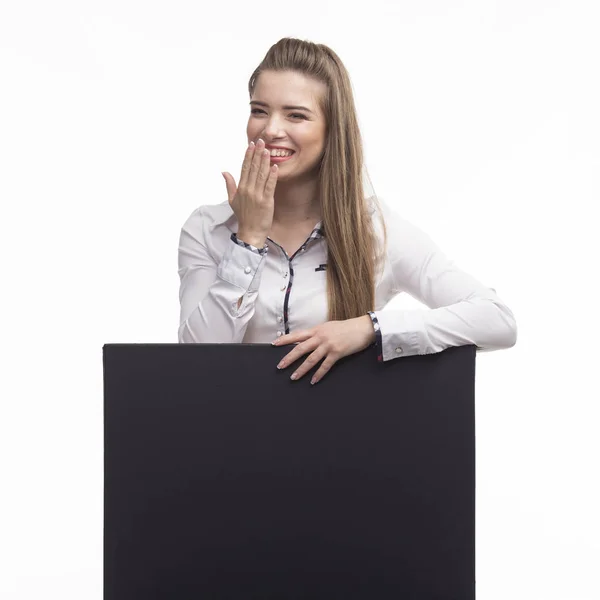 Joven mujer feliz mostrando la presentación, señalando en el cartel — Foto de Stock