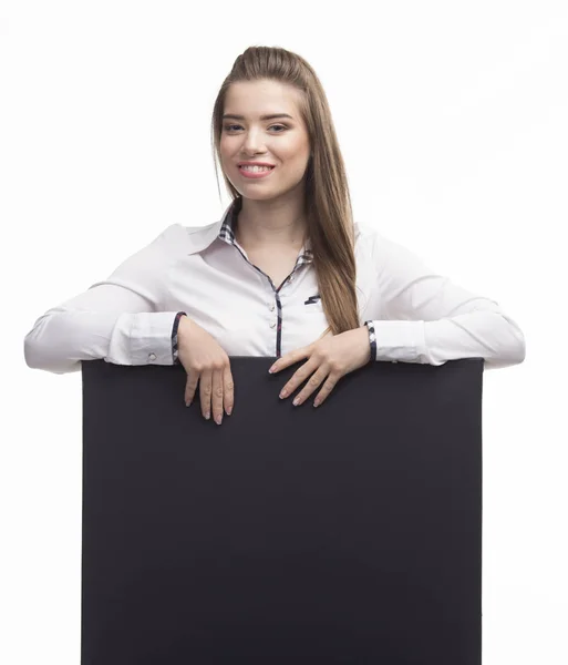 Giovane donna felice mostra presentazione, che punta sul cartello sopra — Foto Stock
