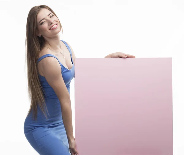 Joven mujer feliz mostrando la presentación, señalando en el cartel — Foto de Stock