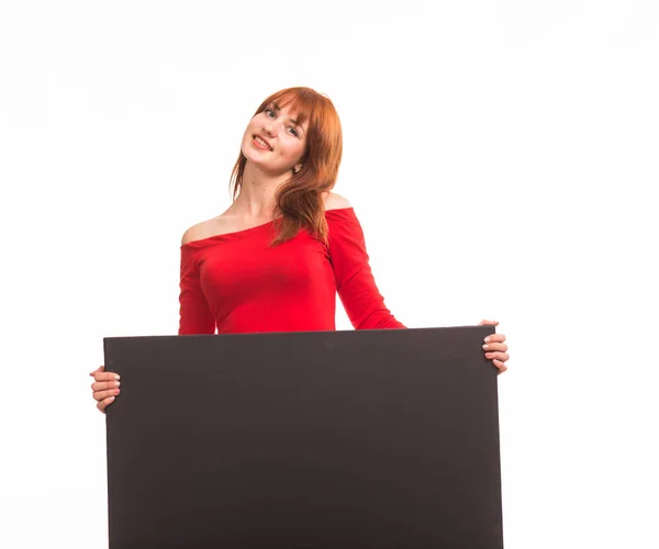 Joven mujer feliz mostrando la presentación, señalando en el cartel — Foto de Stock