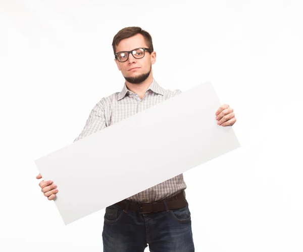 Młody człowiek smutny pokazano prezentacji, wskazując na afisz — Zdjęcie stockowe