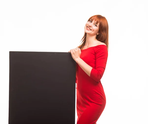 Fiatal, boldog nő bemutató prezentáció, rámutatva a plakát — Stock Fotó