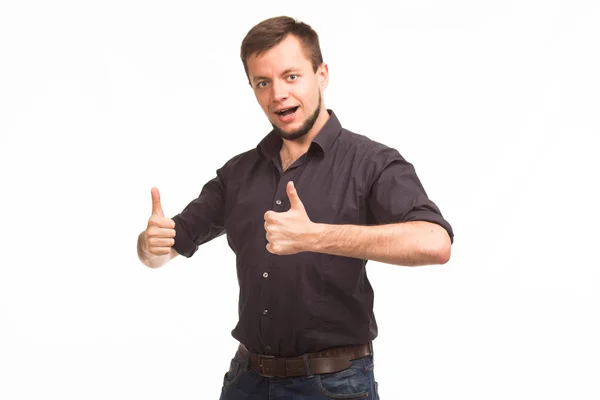 Young glad man showing presentation, pointing on placard — Stock Photo, Image