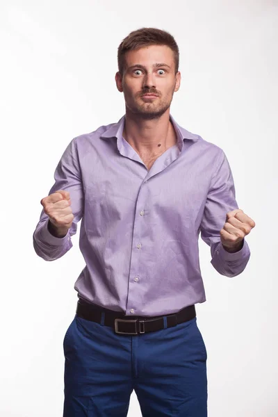 Young playful man showing presentation, pointing on placard Stock Photo by  ©olharozova 162410462