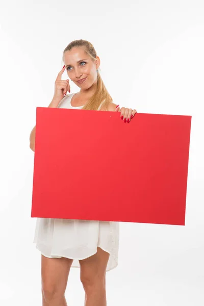 Joven mujer melancólica mostrando la presentación, señalando en el cartel . — Foto de Stock