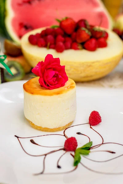 Raspberry Cheesecake with cheese tenderness and a light tinge of raspberry fruit