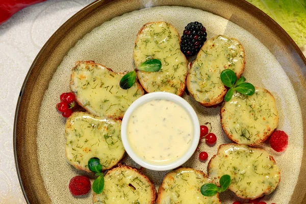 garlic bread with cheese and herbs on a white decorated table