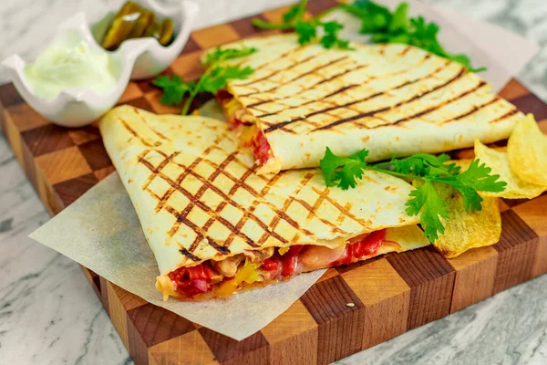 quesadillas with vegetables and jalapenos with sauce