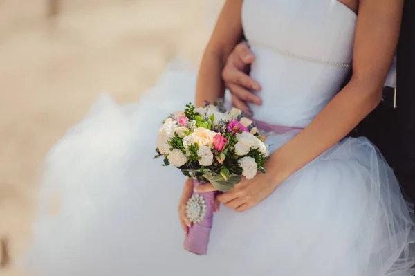 Bride holding big wedding bouquet on wedding ceremony — Stock Photo, Image