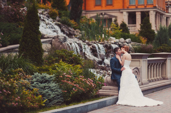 Beautiful bride and groom couple walking at the wedding