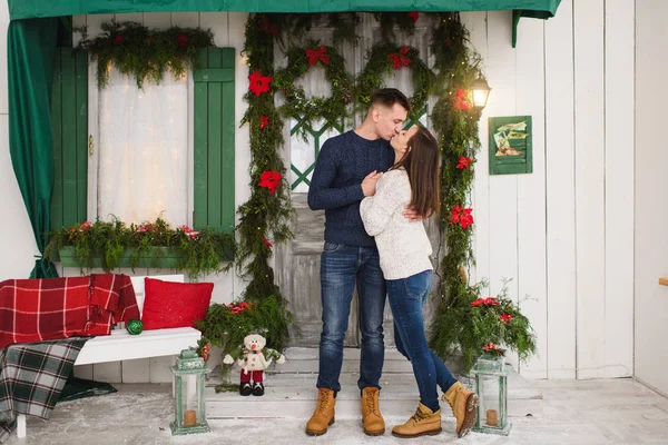 Happy beautiful young couple in love dressed in sweater staying — Stock Photo, Image