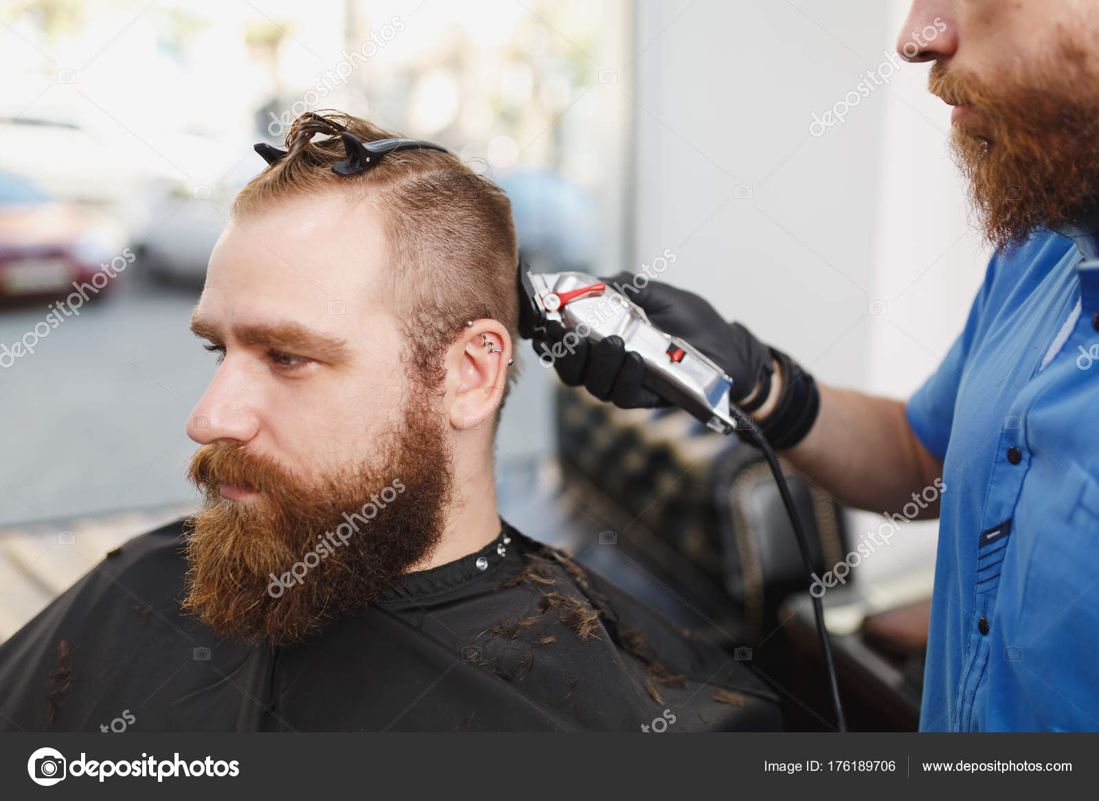 Close Up Of Male Professional Hairdresser Serving Client By