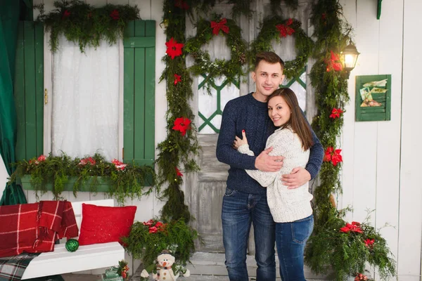 Happy beautiful young couple in love dressed in sweater staying — Stock Photo, Image