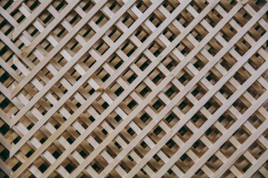 Arka plan, diyagonal ahşap ızgara. Ahşap kafes dokusuna.