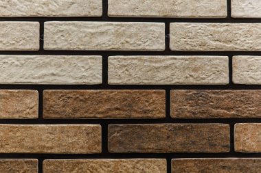 Taş duvar tuğla doku arka plan bej yüzey cephe tasarımı ve dekorasyon için.