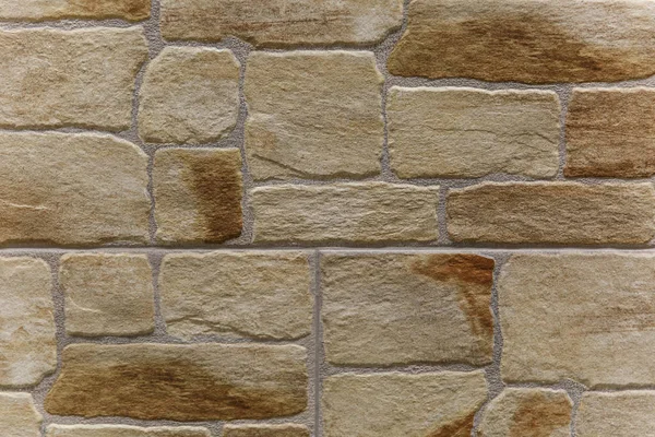 Piedra pared ladrillo textura fondo beige superficie fachada para el diseño y la decoración . — Foto de Stock