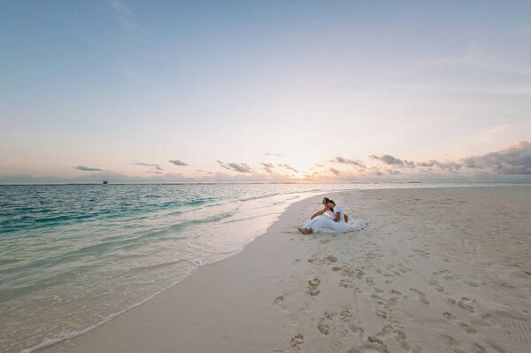 Wedding couple on the beach on the island