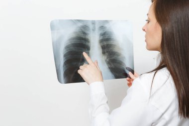 Close up doctor woman with X-ray of lungs, fluorography, roentgen isolated on white background. Female doctor in medical gown stethoscope. Healthcare personnel, medicine concept. Pneumonia. Back view. clipart