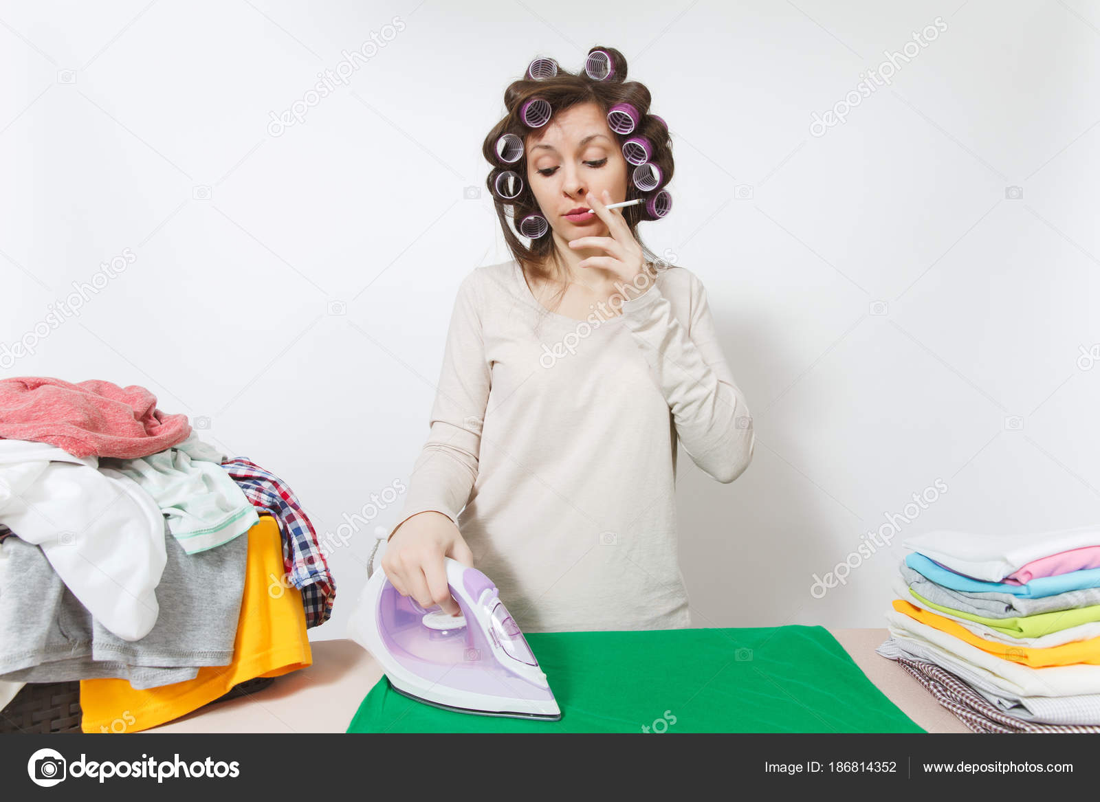Distressed Fun Housewife With Curlers On Hair In Light Clothes