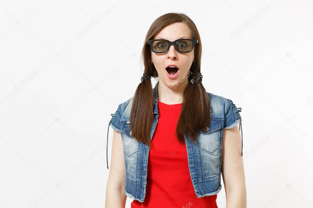 Portrait of young shocked attractive brunette woman with opened mouth in 3d glasses and casual clothes watching movie, film isolated in studio on white background. Emotions in cinema concept