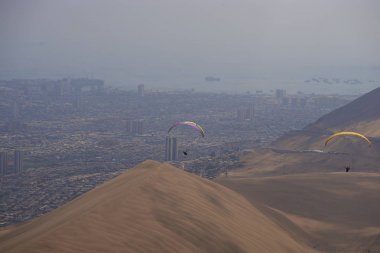 Paragliding over Iquique in northern Chile clipart